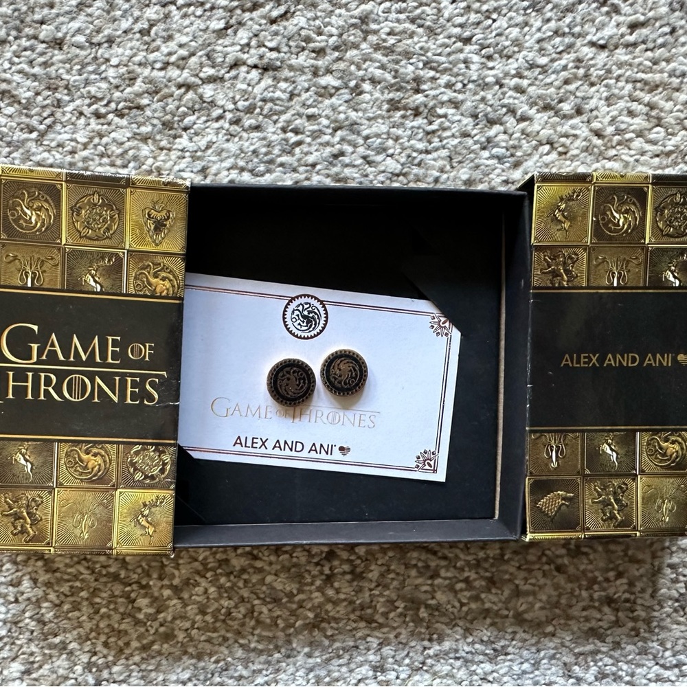 Never worn Alex and Ani GOT earrings